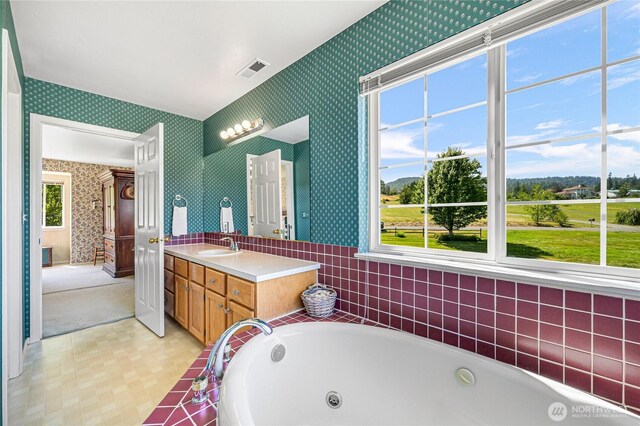 2470 Lee Way, Bellingham, WA 98226 - bathroom featuring wallpapered walls, a whirlpool tub, and vanity