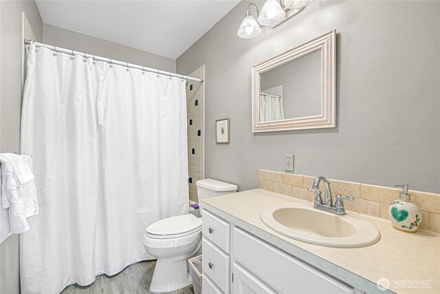 2470 Lee Way, Bellingham, WA 98226 - bathroom with toilet, vanity, and a shower with curtain