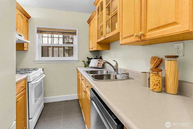 516 E Thomas St Unit 105, Seattle, WA 98102 - kitchen featuring a sink, dishwasher, white range with gas stovetop, under cabinet range hood, and light countertops