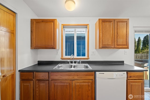 412 Algona Blvd S, Algona, WA 98001 - kitchen featuring dishwasher, dark countertops, brown cabinetry, and healthy amount of natural light