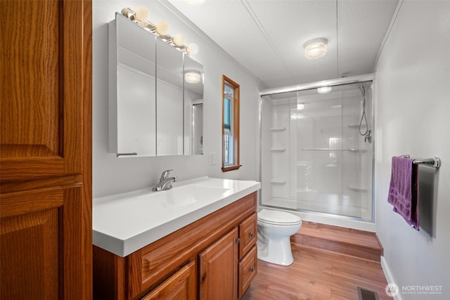 412 Algona Blvd S, Algona, WA 98001 - bathroom featuring a stall shower, vanity, and wood finished floors