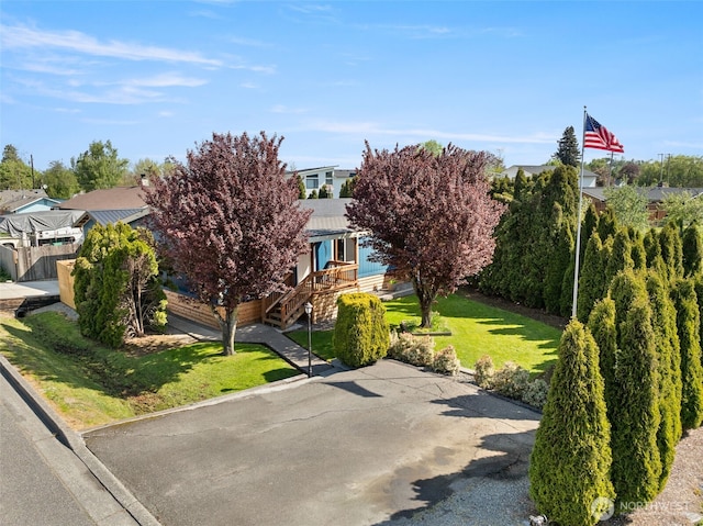 412 Algona Blvd S, Algona, WA 98001 - obstructed view of property featuring a front lawn and a residential view