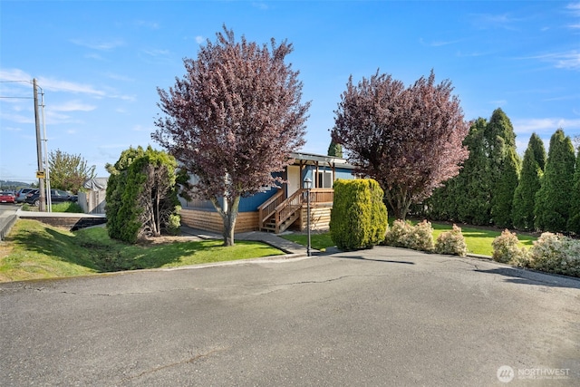 412 Algona Blvd S, Algona, WA 98001 - view of property hidden behind natural elements with stairs and a front lawn