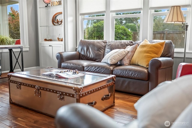 515 4th Ave SW, Puyallup, WA 98371 - living room featuring healthy amount of natural light and wood finished floors