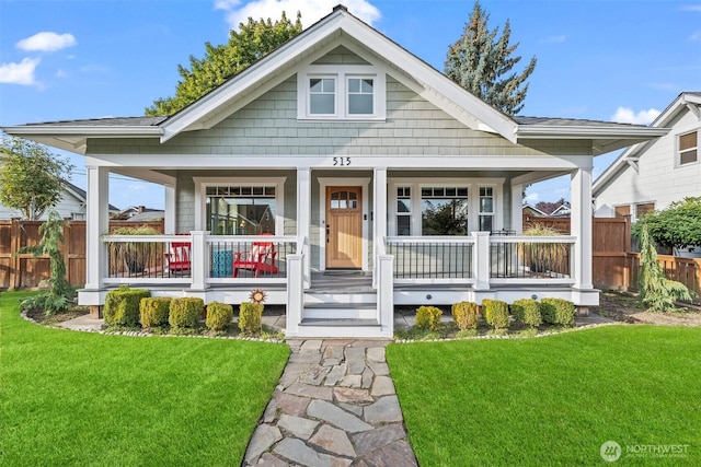 515 4th Ave SW, Puyallup, WA 98371 - view of front facade featuring covered porch and roof with shingles
