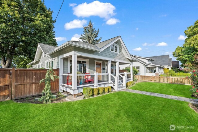 515 4th Ave SW, Puyallup, WA 98371 - view of front of house featuring covered porch and roof with shingles