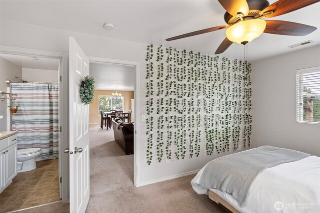 21032 Nordby Dr NW, Poulsbo, WA 98370 - bedroom featuring light carpet, a ceiling fan, and a chandelier