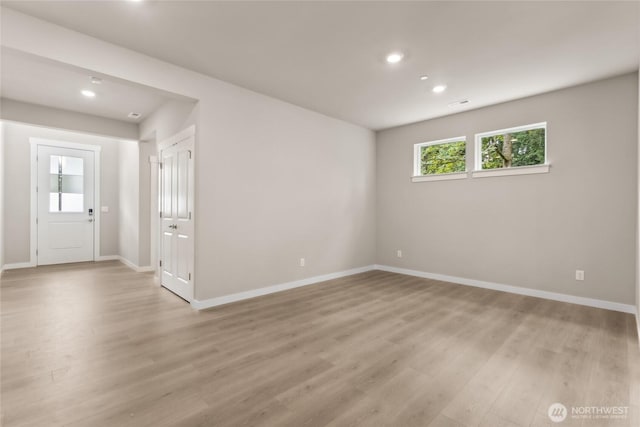 2406 Hyde Ct NE Unit 9, Olympia, WA 98506 - unfurnished room with light wood finished floors, baseboards, and recessed lighting
