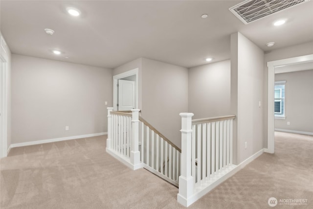 2406 Hyde Ct NE Unit 9, Olympia, WA 98506 - hallway featuring an upstairs landing, carpet, recessed lighting, and baseboards