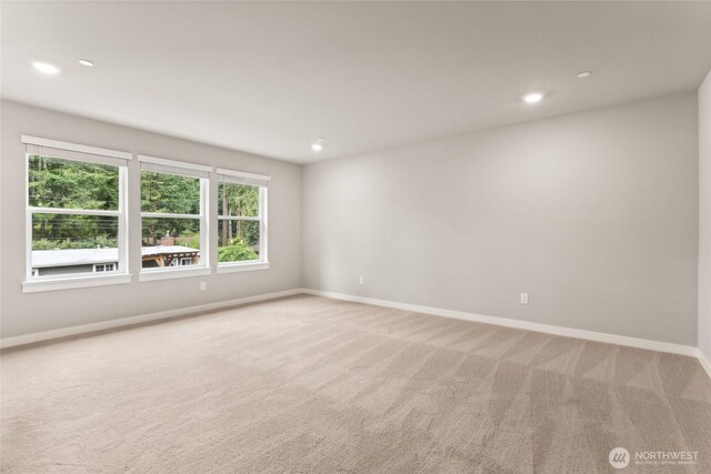 2406 Hyde Ct NE Unit 9, Olympia, WA 98506 - unfurnished room featuring baseboards, light colored carpet, and recessed lighting