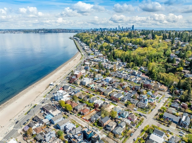 2630 58th Ave SW Unit 1-4, Seattle, WA 98116 - aerial view of property and surrounding area featuring a nearby body of water and nearby suburban area