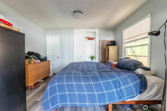 2630 58th Ave SW Unit 1-4, Seattle, WA 98116 - bedroom featuring wood finished floors