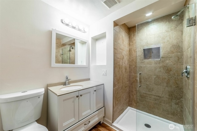 2630 58th Ave SW Unit 1-4, Seattle, WA 98116 - full bathroom featuring a shower stall, vanity, and toilet