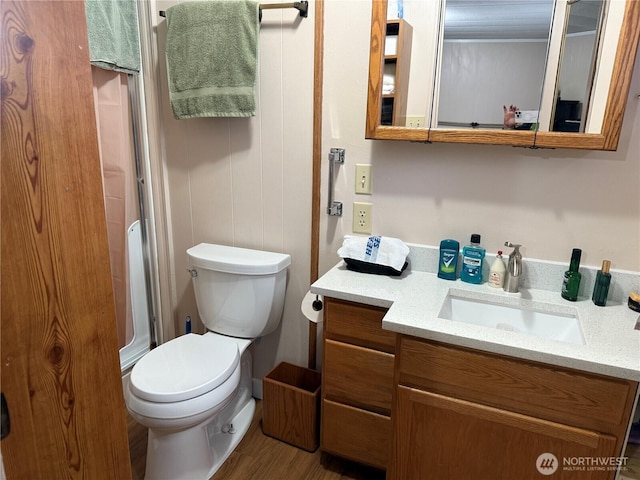 1415 84th St SE Unit 45, Everett, WA 98208 - full bathroom featuring wood finished floors, a shower, toilet, and vanity