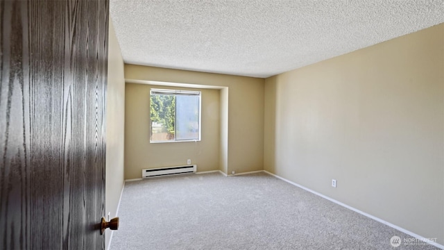 unfurnished room with a baseboard radiator, carpet flooring, a textured ceiling, and baseboards
