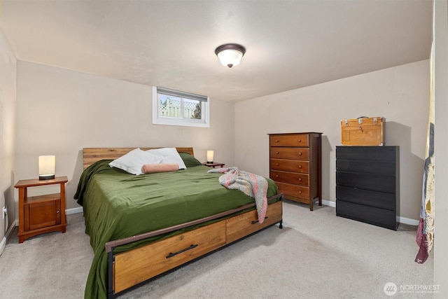 carpeted bedroom with baseboards