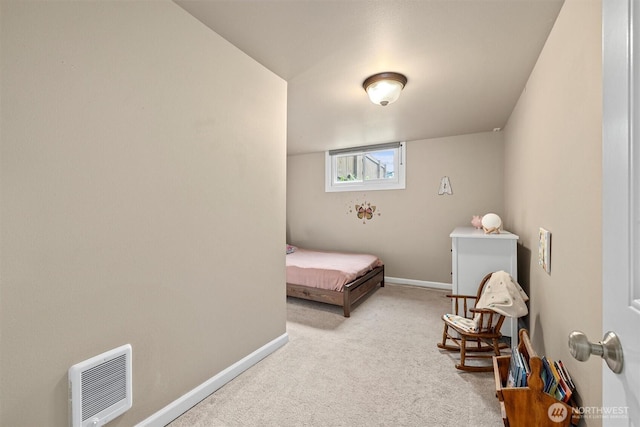 carpeted bedroom with baseboards