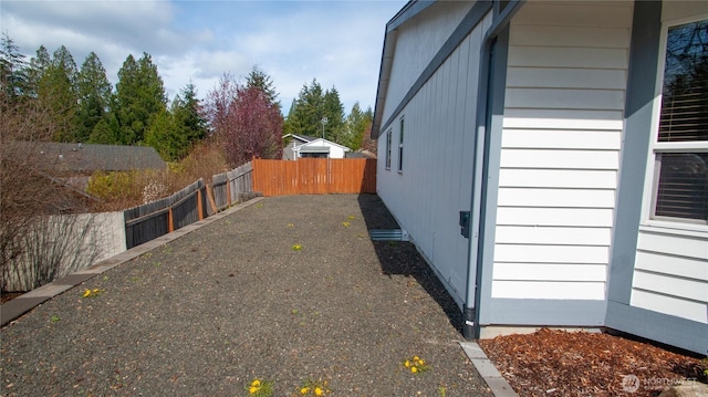 71 E N Bay Pl, Allyn, WA 98524 - view of home's exterior with a fenced backyard