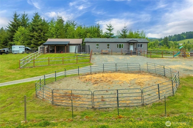 882 Independence Rd, Rochester, WA 98579 - surrounding community featuring an outdoor structure, a rural view, a lawn, and an exterior structure