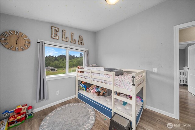 882 Independence Rd, Rochester, WA 98579 - bedroom with baseboards and wood finished floors