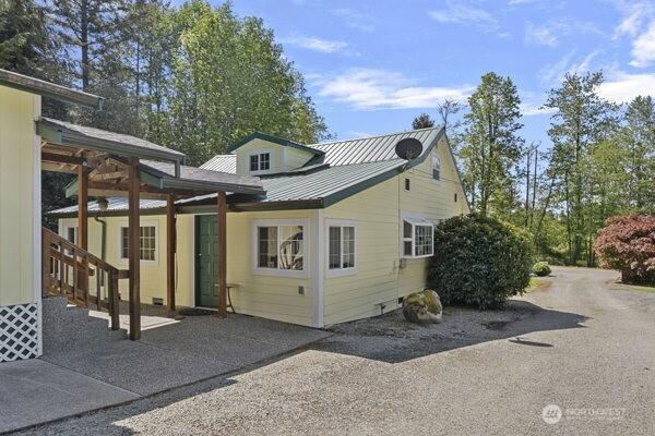 back of property with metal roof