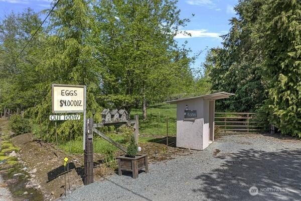 surrounding community featuring a gate