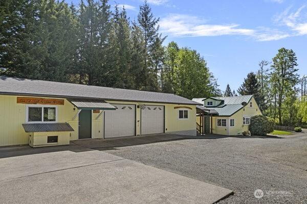 ranch-style home featuring an attached garage and driveway