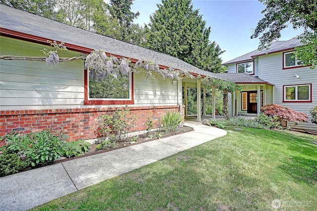 955 Michael Way, Camano Island, WA 98282 - view of front of house featuring brick siding and a front yard