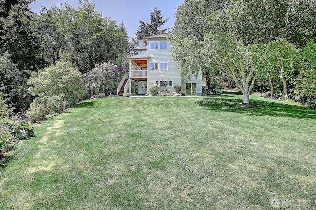 955 Michael Way, Camano Island, WA 98282 - view of grassy yard with stairs and a wooden deck