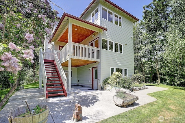 955 Michael Way, Camano Island, WA 98282 - rear view of property with a patio area, a lawn, a wooden deck, and stairway