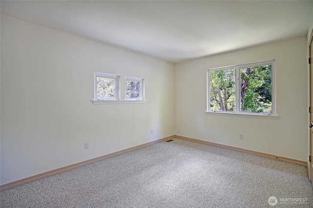 955 Michael Way, Camano Island, WA 98282 - spare room featuring healthy amount of natural light, carpet floors, and baseboards