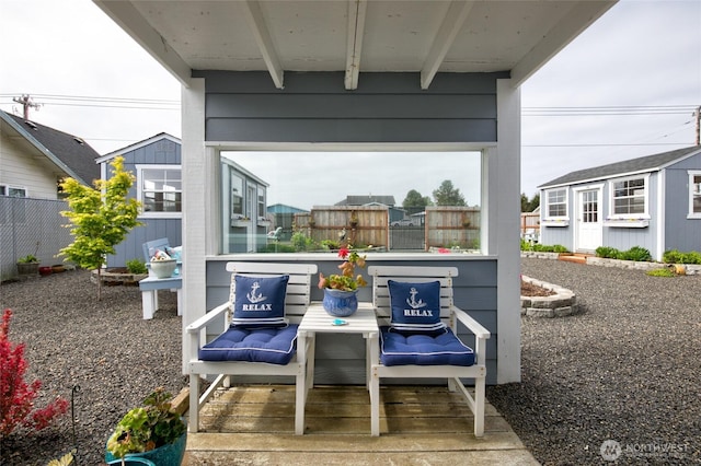 view of patio featuring fence