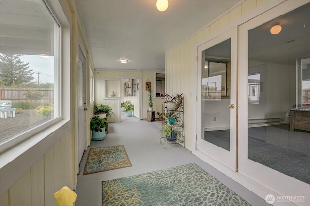 sunroom / solarium with baseboard heating