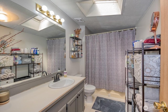 full bathroom with a shower with shower curtain, vanity, toilet, and tile patterned floors