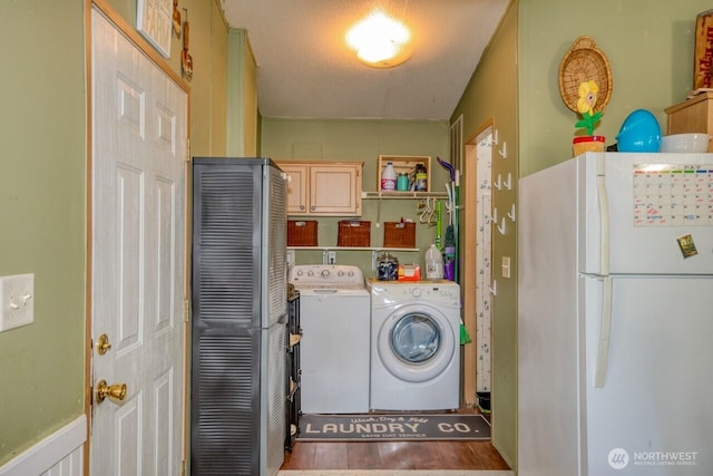 laundry room with independent washer and dryer