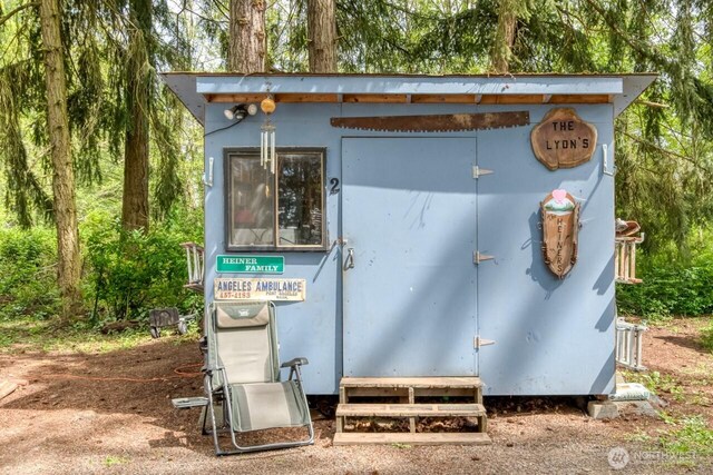 view of outbuilding with an outdoor structure