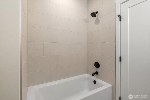 bathroom featuring bathing tub / shower combination