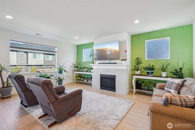 18009 NE 46th Ct, Vancouver, WA 98686 - living room featuring recessed lighting, a fireplace, wood finished floors, and baseboards