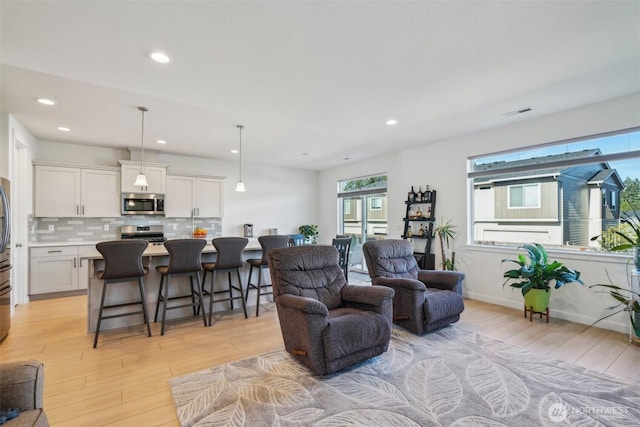18009 NE 46th Ct, Vancouver, WA 98686 - living room featuring light wood-style flooring and recessed lighting