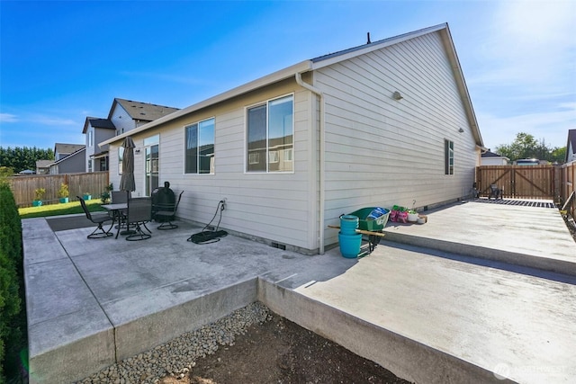 18009 NE 46th Ct, Vancouver, WA 98686 - rear view of house with a patio and a fenced backyard