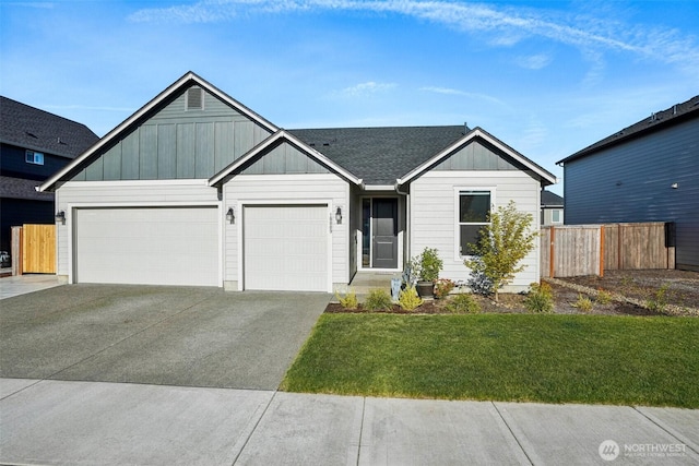 18009 NE 46th Ct, Vancouver, WA 98686 - ranch-style home with driveway, an attached garage, and board and batten siding