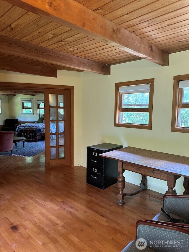 5790 NE Old Mill Rd NE, Bainbridge Island, WA 98110 - dining space featuring wood finished floors, beam ceiling, wooden ceiling, and french doors