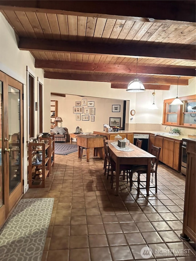 5790 NE Old Mill Rd NE, Bainbridge Island, WA 98110 - tiled dining area with wooden ceiling, beamed ceiling, and a sink