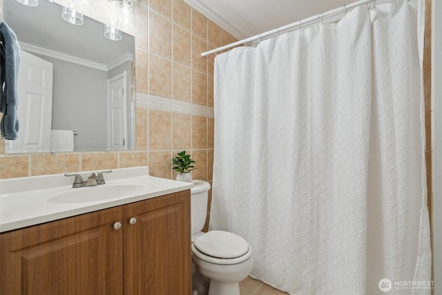 bathroom with tile walls, toilet, ornamental molding, vanity, and a shower with shower curtain