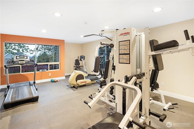 gym featuring baseboards and recessed lighting