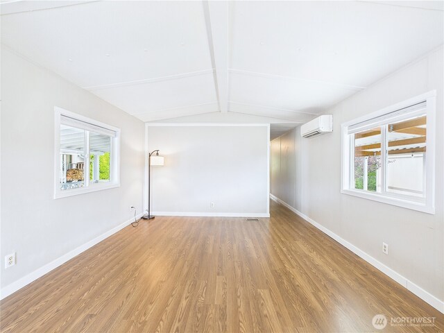 212 Old Owen Rd Unit 43, Sultan, WA 98294 - unfurnished room featuring light wood-type flooring, a wall mounted air conditioner, and baseboards