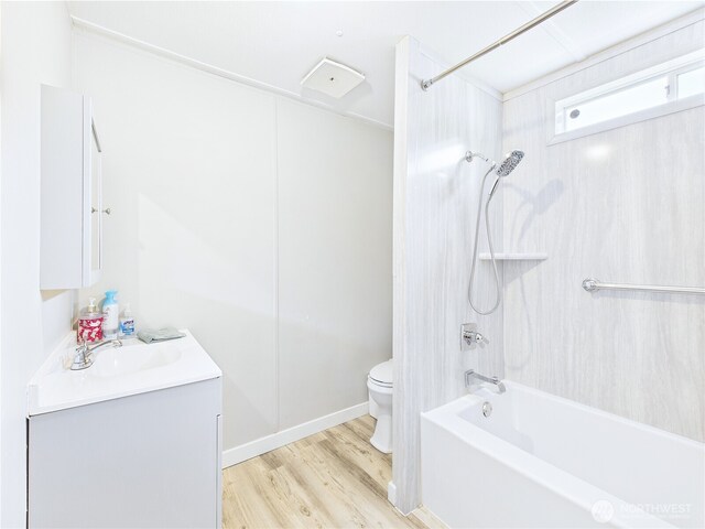 212 Old Owen Rd Unit 43, Sultan, WA 98294 - bathroom with toilet, wood finished floors, washtub / shower combination, and vanity