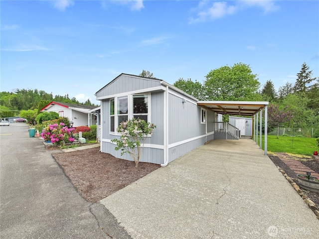 212 Old Owen Rd Unit 43, Sultan, WA 98294 - view of front of property featuring concrete driveway and an attached carport