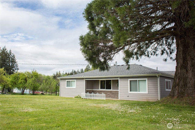343 Hawkins Rd, Winlock, WA 98596 - back of property with a yard and a shingled roof