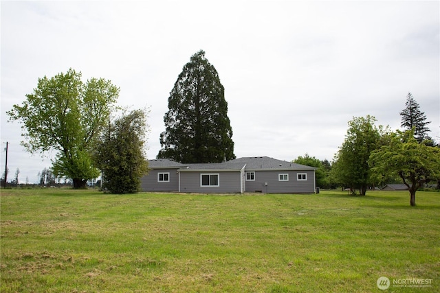 343 Hawkins Rd, Winlock, WA 98596 - back of house featuring a yard